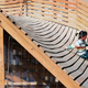 Image for article titled The Roof of This Sloped Library Doubles as an Awesome Slide